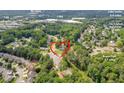 An aerial view shows the property's convenient location near major roads, parks, schools, and shopping centers at 3642 S Bogan Rd, Buford, GA 30519