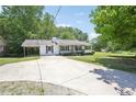 Exterior view of the home and the driveway at 3388 Hamilton Mill Rd, Buford, GA 30519