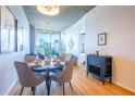 Stylish dining area with hardwood floors and views of the city skyline at 860 Peachtree Ne St # 1613, Atlanta, GA 30308
