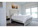 Cozy bedroom with soft carpet, modern bed frame, and bright natural light, creating a relaxing space at 3615 Hawthorne Terrace, Atlanta, GA 30337
