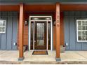 Inviting front entrance boasting a stylish door and decorative columns with the house number at 1255 Plaza Sw Ave, Atlanta, GA 30310