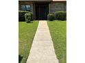 Well-maintained front yard and walkway lead to the welcoming front door of this lovely home at 5526 Stoneleigh Ct, Stone Mountain, GA 30088