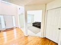 Welcoming entry with hardwood floors and a view of the living room at 665 Roxford Ln, Buford, GA 30518
