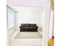 Bright living room with carpet flooring and abundant natural light at 665 Roxford Ln, Buford, GA 30518
