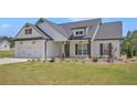 Beautiful single-Gathering home with a two-car garage, craftsman features, and well-manicured lawn at 461 Barnwood Dr, Rockmart, GA 30153