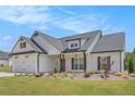 Beautiful single-Gathering home with a two-car garage, craftsman features, and well-manicured lawn at 461 Barnwood Dr, Rockmart, GA 30153