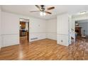 Elegant dining room with hardwood floors, wainscoting, and open access to the kitchen, perfect for entertaining at 1369 Willowbrook Sw Dr, Marietta, GA 30064
