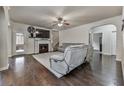 Inviting living room with hardwood floors, fireplace, and comfortable seating area at 1510 Silver Mist Cir, Powder Springs, GA 30127
