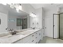 Spacious primary bathroom with double sinks, a granite countertop, and a tiled shower at 3455 Henderson Dr, Cumming, GA 30041