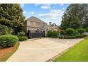 Spacious backyard featuring a sport court, lush lawn, and a deck perfect for outdoor entertaining at 3495 Mill Bridge Dr, Marietta, GA 30062