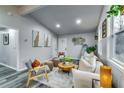Inviting living room with modern furnishings, and lots of natural light from the large windows at 2162 Westover Dr, Atlanta, GA 30344