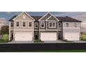 Row of new townhomes showcasing a variety of siding colors and garage doors at 216 Seward St # 93, Conyers, GA 30094