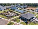 Aerial view of community amenities including community garden, tennis court, and gathering area at 404 Vinca Nw Cir, Kennesaw, GA 30144