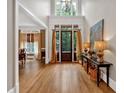 Elegant foyer with hardwood flooring, high ceilings, and natural light at 511 Etris Ct, Roswell, GA 30075