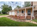Lovely front porch view with a well-manicured flower bed, leading to a convenient two-car garage at 618 Summerville Dr, Lawrenceville, GA 30046