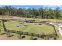 Community dog park offers a fenced in, safe space for pets to exercise and play at 199 Vinca Nw Cir, Kennesaw, GA 30144