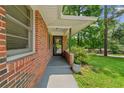 Cozy front porch with brick accents and space for outdoor decor at 2493 Springdale Rd, Atlanta, GA 30315