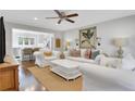 Bright living room with neutral decor, hardwood floors, and an open layout perfect for relaxation at 435 Grenock Cir, Atlanta, GA 30328