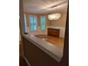 Elegant dining room featuring a modern chandelier and bright windows at 1416 Oakridge Cir, Decatur, GA 30033
