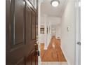 Inviting foyer featuring hardwood floors and neutral paint at 1416 Oakridge Cir, Decatur, GA 30033