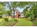 Well-kept lawn and landscaping surround this house, creating a beautiful curb appeal at 524 Stephens Point Se Dr, Lawrenceville, GA 30045