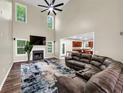 Bright living room with a cozy fireplace, high ceilings, and an open layout at 4375 Split Creek Dr, Douglasville, GA 30135