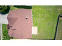 Aerial view of a home showing its roofline, yard, and surrounding neighborhood at 3740 Lake Enclave Way, Atlanta, GA 30349
