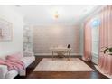Bright home office with a stylish accent wall, modern decor, and plenty of natural light at 4204 Hardy Ave, Smyrna, GA 30082
