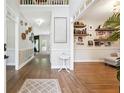 Inviting foyer with hardwood floors, neutral walls, and stylish decor at 4630 Smokestone Dr, Douglasville, GA 30135