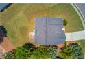 Birds eye view of the home highlighting the roof, lawn and surrounding trees at 2990 Haynes Club Cir, Grayson, GA 30017