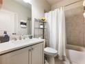 Cozy bathroom with combined shower and tub, soft gray walls and vanity, and silver accents at 2506 Skyland Ne Dr # 17, Atlanta, GA 30319