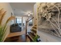 Inviting entryway showcasing hardwood floors, staircase, and a view of the living area at 3137 Spicy Cedar Ln, Lithonia, GA 30038