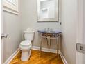 Contemporary powder room with a modern vanity and stylish fixtures at 8650 Hope Mews Ct, Sandy Springs, GA 30350