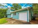 Charming two-story home featuring an attached garage at 1328 Hoy Taylor Dr, Norcross, GA 30093