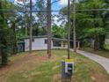 Charming one-story home with a long driveway and a well-maintained lawn at 2575 Flagstone Se Dr, Atlanta, GA 30316