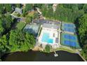 Aerial view showcasing community amenities including a pool and tennis courts at 3338 Breton Ne Cir, Brookhaven, GA 30319
