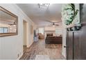 Inviting living room boasts hardwood floors, neutral walls, and seamlessly flows into other areas of the home at 2020 Commonwealth Pl, Cumming, GA 30041