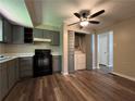 Kitchen featuring laminate flooring and modern appliances at 2065 Sandgate Cir, Atlanta, GA 30349
