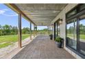 Covered porch featuring stamped concrete, perfect for enjoying the outdoors in style at 1971 Centennial Rd, Rutledge, GA 30663