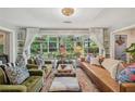 Bright living room with large windows, stylish furnishings, and lots of natural light at 2762 Whispering Pines Dr, Decatur, GA 30033