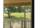 Scenic view from the porch of a well-maintained lawn and surrounding neighborhood at 285 Woodland St, Dallas, GA 30157