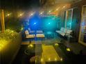 Inviting evening patio with string lights creating a cozy ambiance for outdoor gatherings and relaxation at 3180 Mathieson Drive # 502, Atlanta, GA 30305