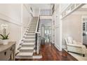 Staircase in the foyer leading to the second floor of the home at 612 Concord Lake Se Cir, Smyrna, GA 30082