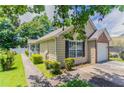 Quaint home showcasing clean lines, manicured landscaping, and an inviting curb appeal in a lovely neighborhood at 1321 Waterton Trl, Douglasville, GA 30134