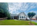 Inviting exterior view of home featuring a lush green lawn and well-maintained landscaping at 1535 Duluth Hwy # 1101, Lawrenceville, GA 30043