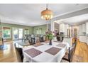 Open-concept dining area, seamlessly connected to the living room and kitchen at 2190 Stephen Long Ne Dr, Atlanta, GA 30305