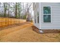 Spacious backyard with a wooden fence, offering a private outdoor space at 4700 Blake Loop, Atlanta, GA 30349
