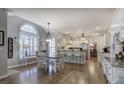 Bright and airy kitchen with a breakfast nook, stainless steel appliances, and hardwood floors at 5327 Saville Nw Dr, Acworth, GA 30101