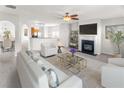Inviting living room featuring a cozy fireplace, stylish furniture, and an open layout with neutral tones at 3134 Imperial Sw Cir, Atlanta, GA 30311