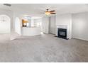Spacious living room with an open floor plan, fireplace, and neutral walls creating a versatile living space at 3134 Imperial Sw Cir, Atlanta, GA 30311